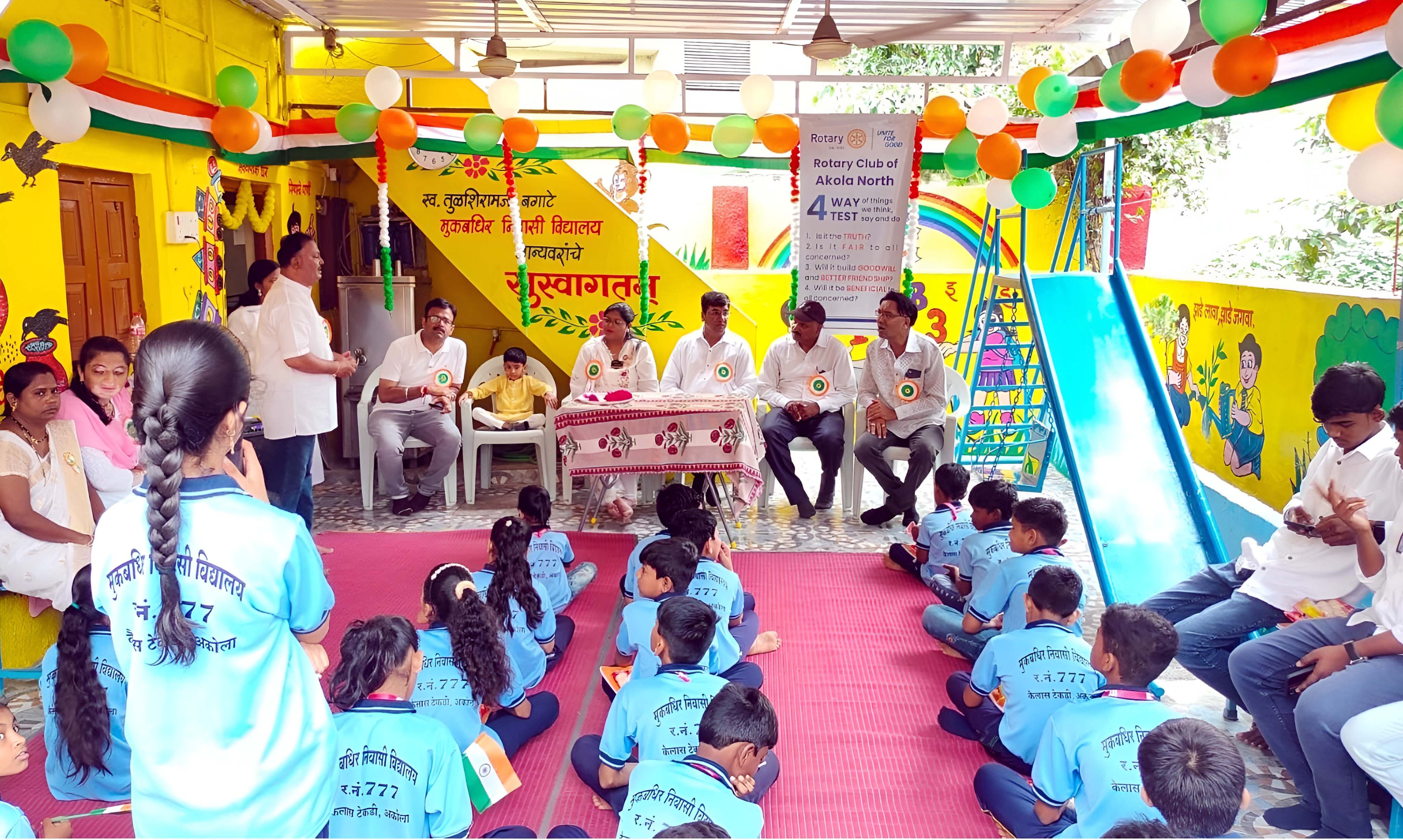 Interaction between dignitaries and students at a special school event