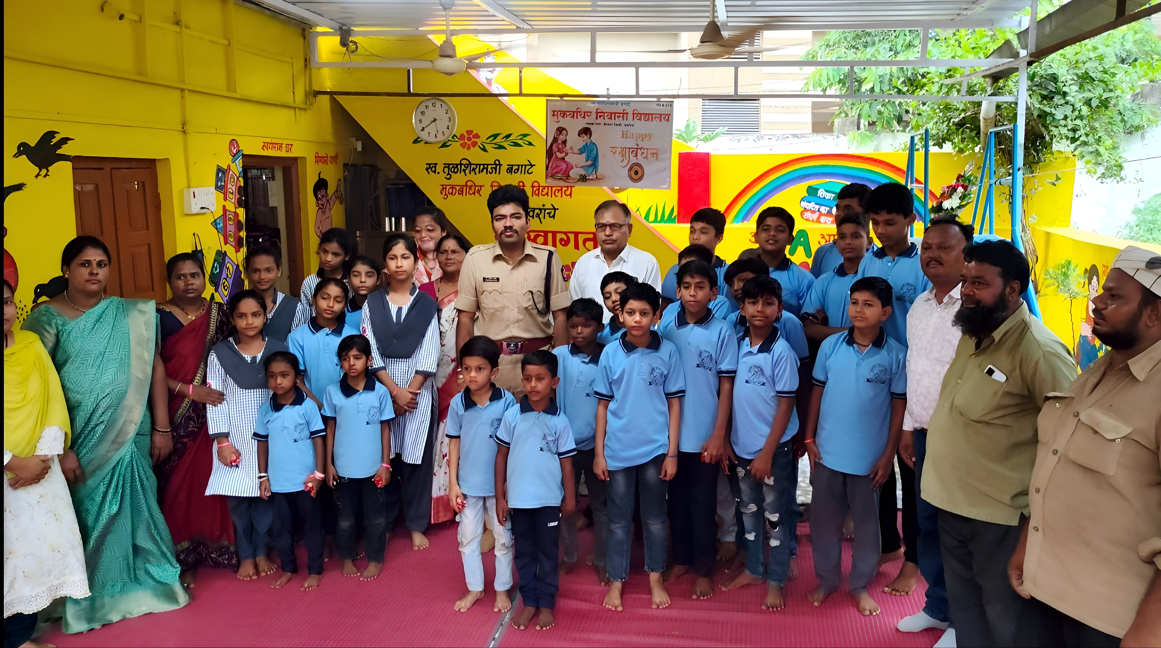 Rakhi celebration attended by dignitaries, teachers, and deaf and hard-of-hearing students